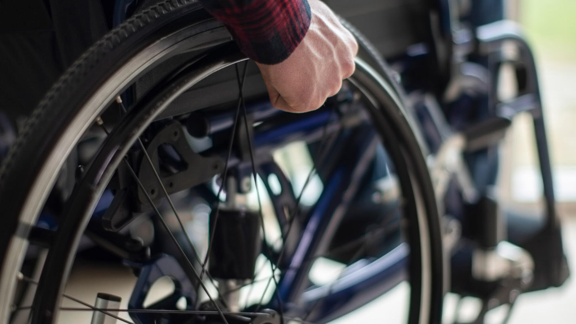 Side shot of man in wheelchair