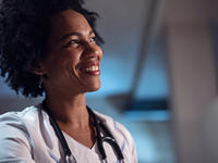 Portrait of smiling black female doctor