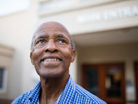 Senior black man looking up